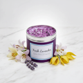 Fresh Lavender deep purple tin candle with amethyst crystal topping on marble surface