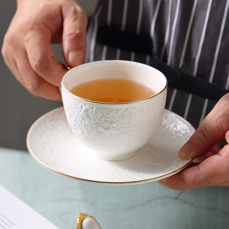 Embossed Bone China Tea Cup & Saucer Set – White & Gold
