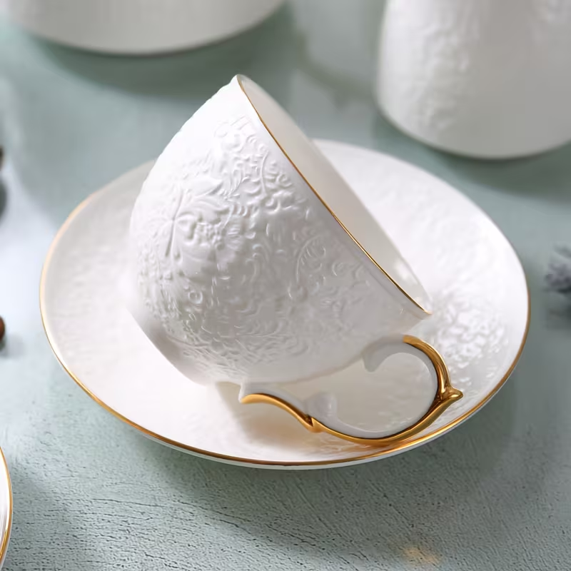 Embossed Bone China Tea Cup & Saucer Set – White & Gold